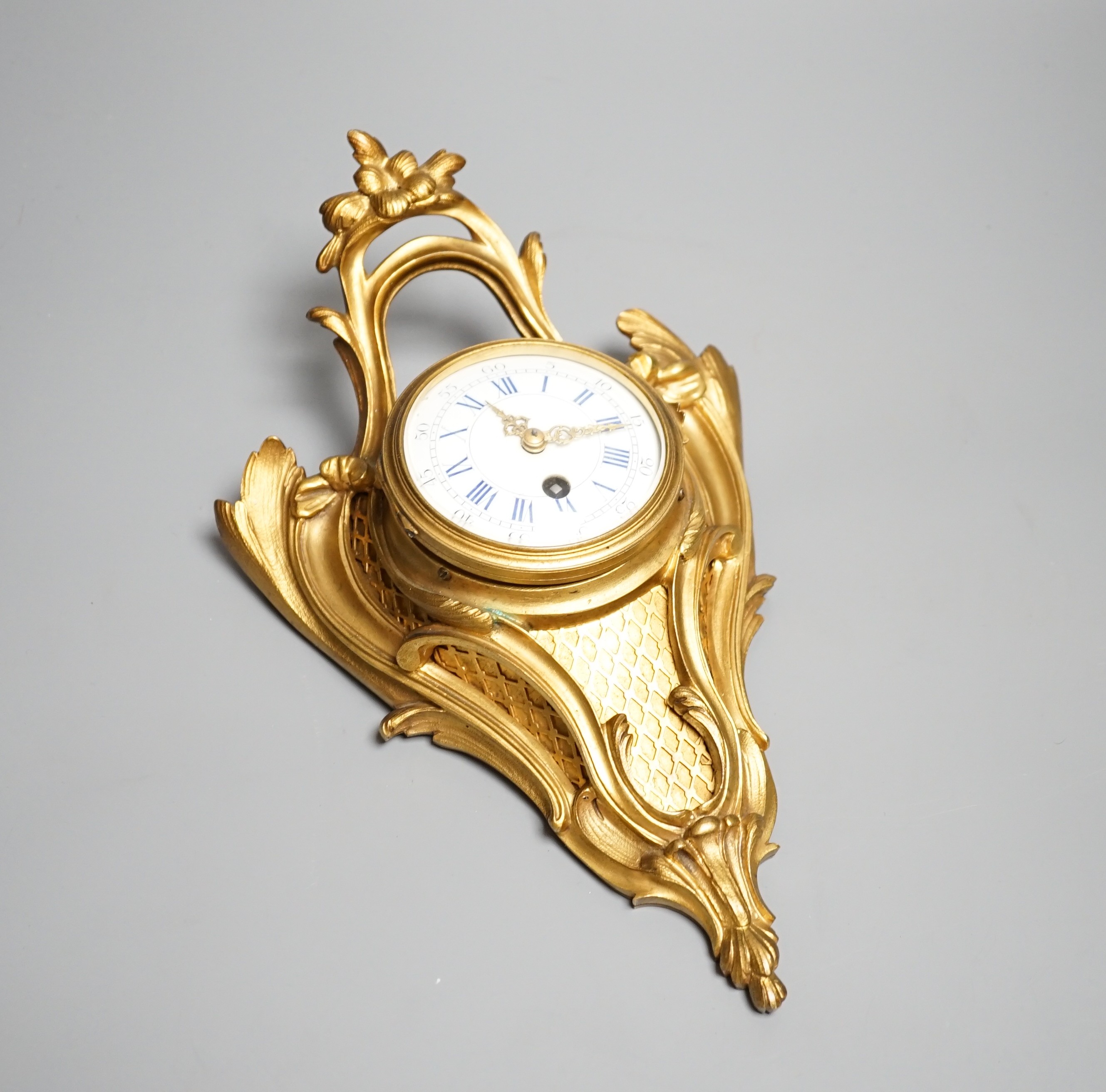 A 19th century French eight day ormolu cartel timepiece, height 29cm